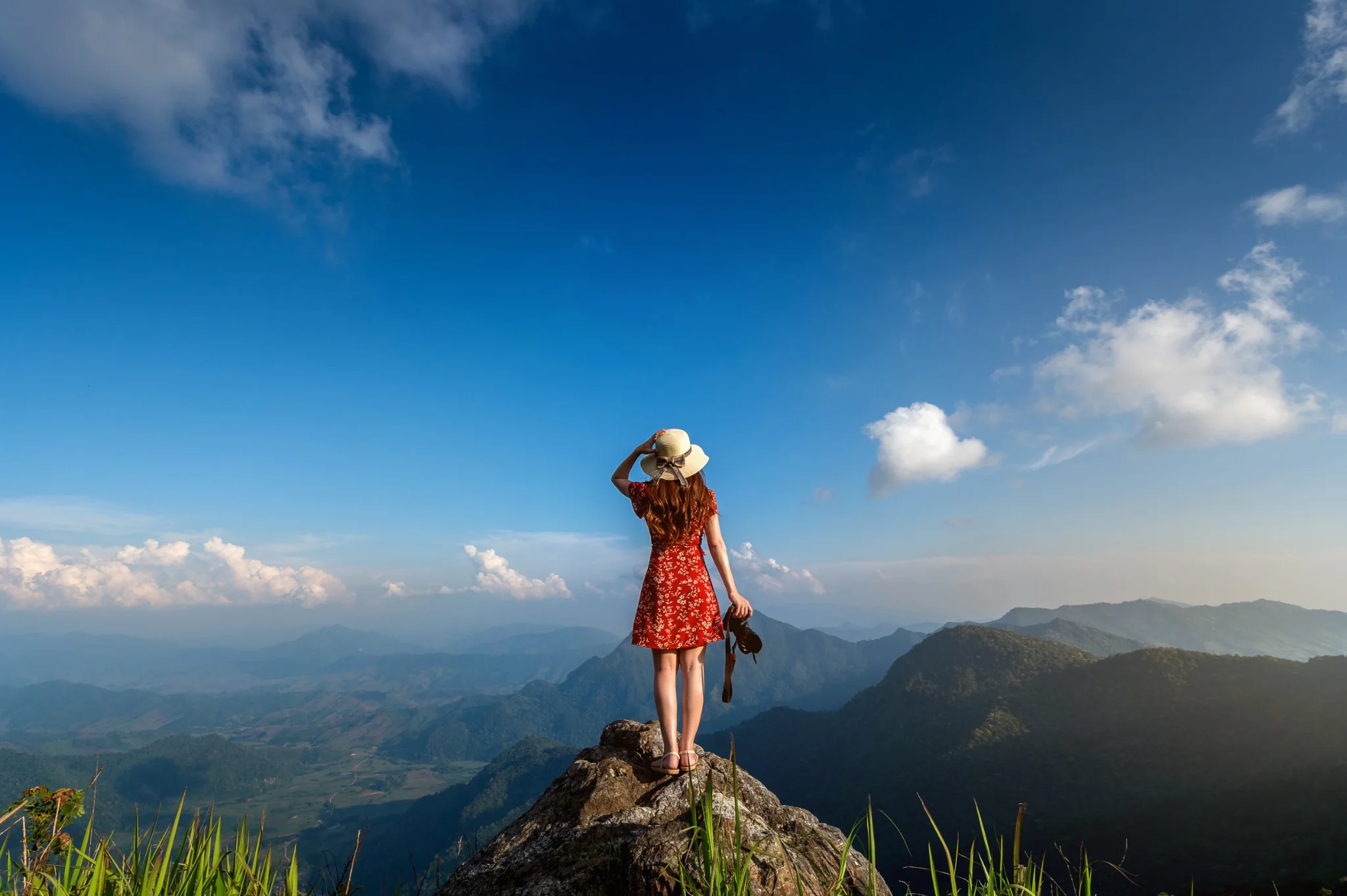 Traveller overlooking a mountain landscape